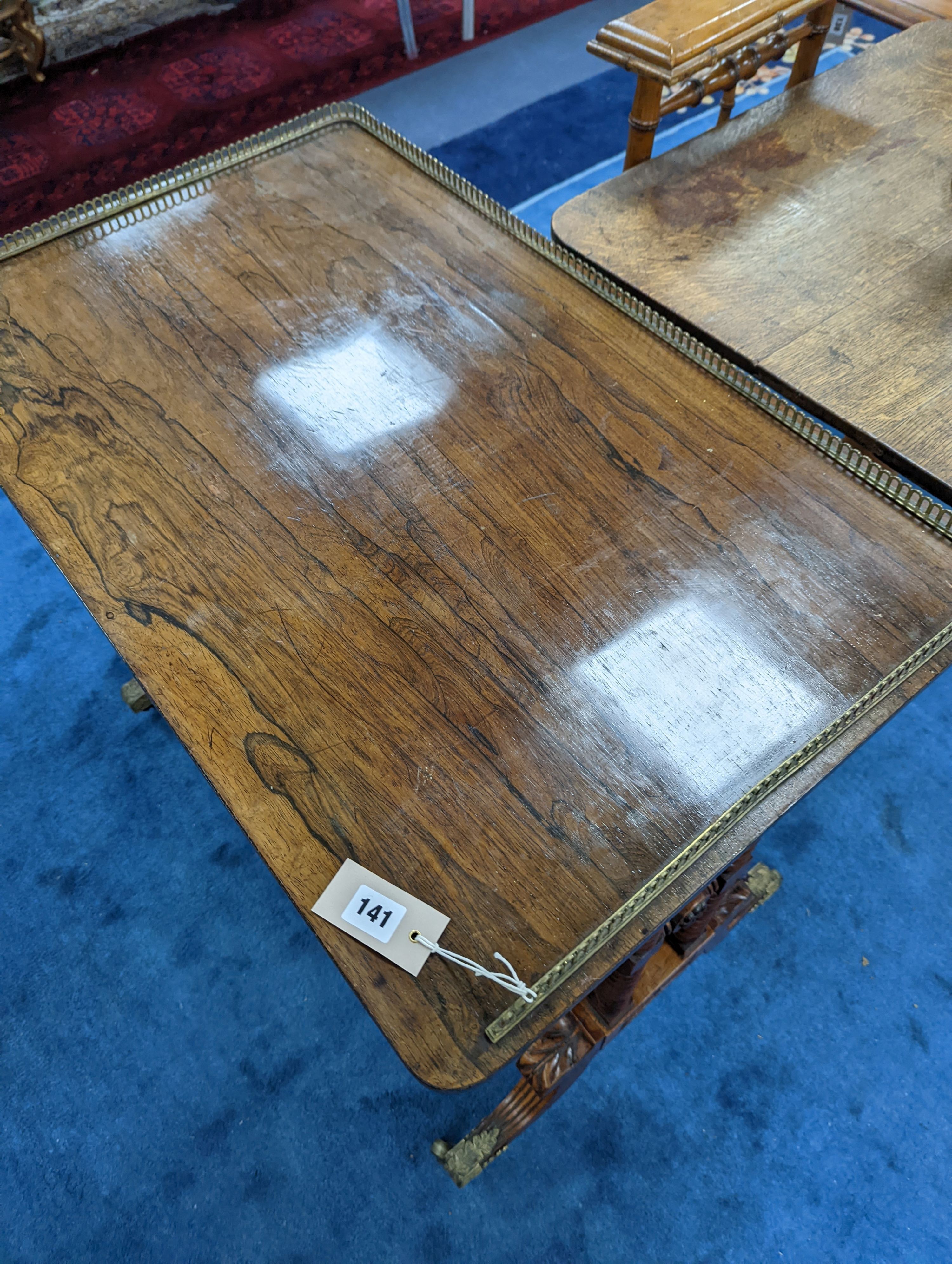 A late Regency rectangular rosewood galleried centre table, width 84cm, depth 52cm, height 74cm